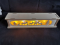 Preview: Schwibbogen Unterstellbank"Rehe an der Futterkrippe und Schneemannfiguren"48 x 10 x 13 cm mit LED, Batterie u. Netzbetrieb