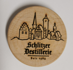 Der Mückendeckel mit dem Schlitzer Destillerie Logo